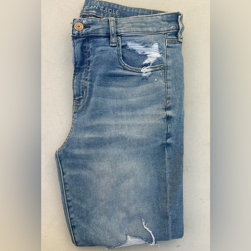 American Eagle Blue Jeggings with Vintage Fading and Distressed Details
